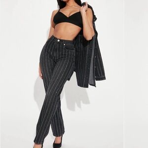 Black Pinstripe Pants with rhinestone embellishments.